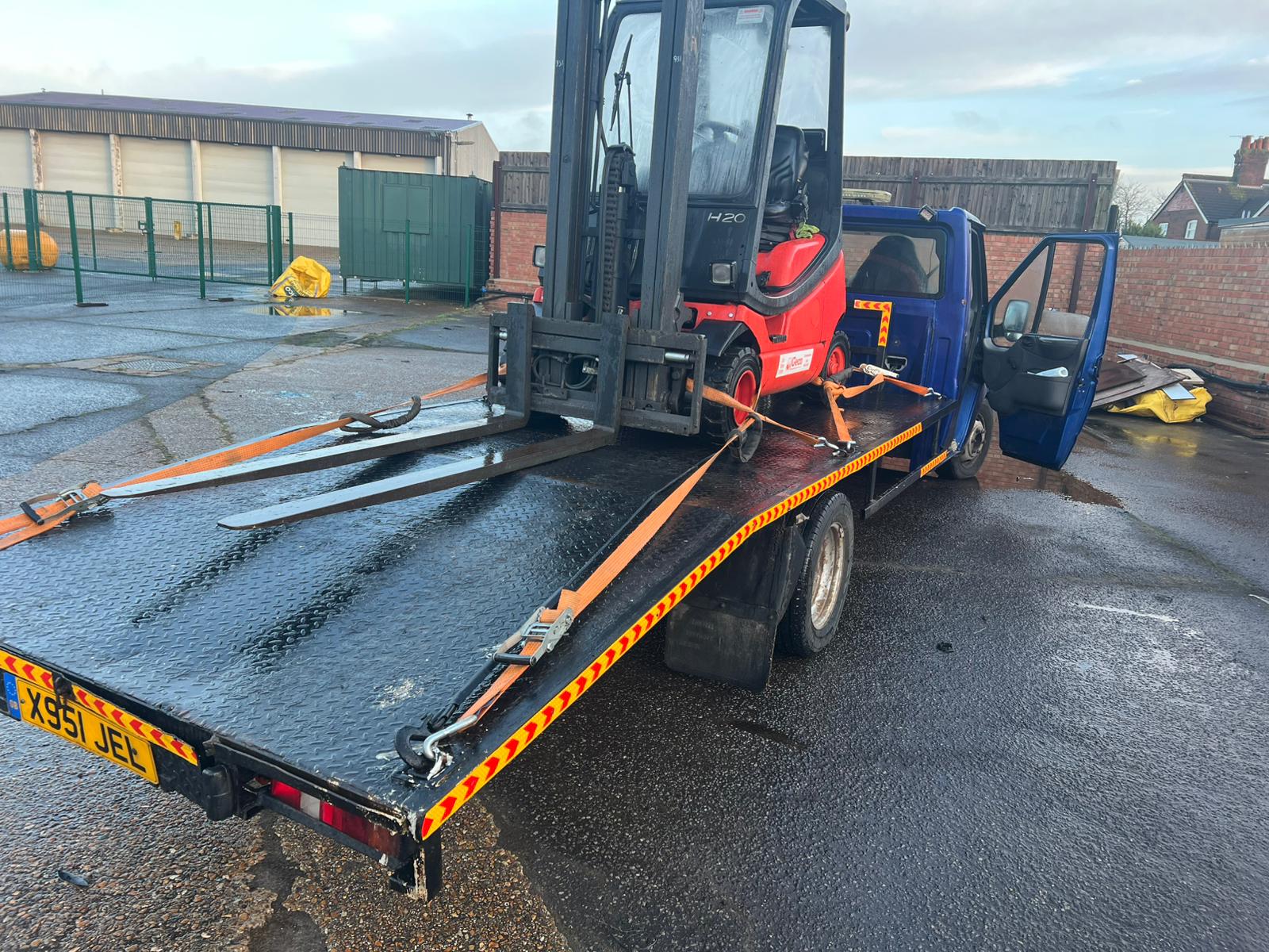 Local recovery team preparing a vehicle for collection